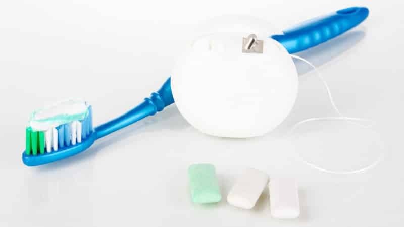 Lazos de limpieza de los dientes contras de piedra