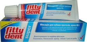 Fittident cream - photo of a fixing cream for dentures
