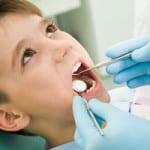 La caries dental en niños: síntomas, prevención, tratamiento, fotos