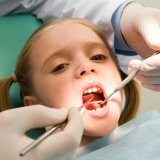 Treatment of caries of infant teeth