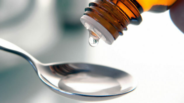 A teaspoon with vaseline oil from constipation