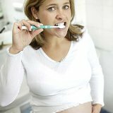 Wie man die Zähne in der Schwangerschaft hält